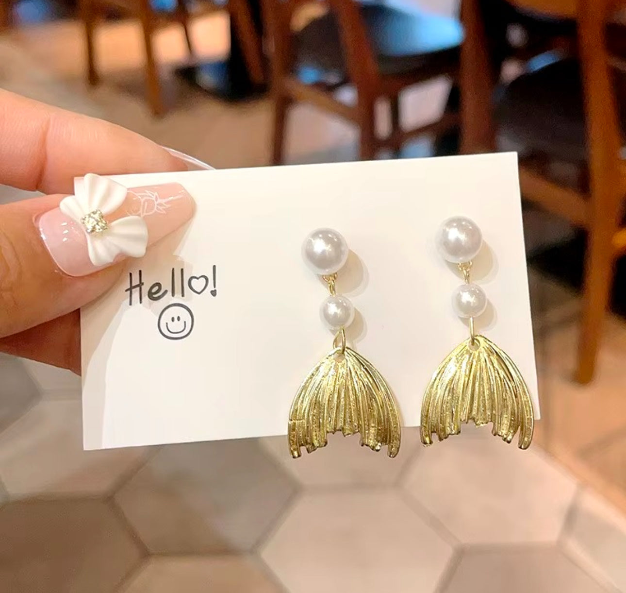 Metal pearl fishtail drop earrings