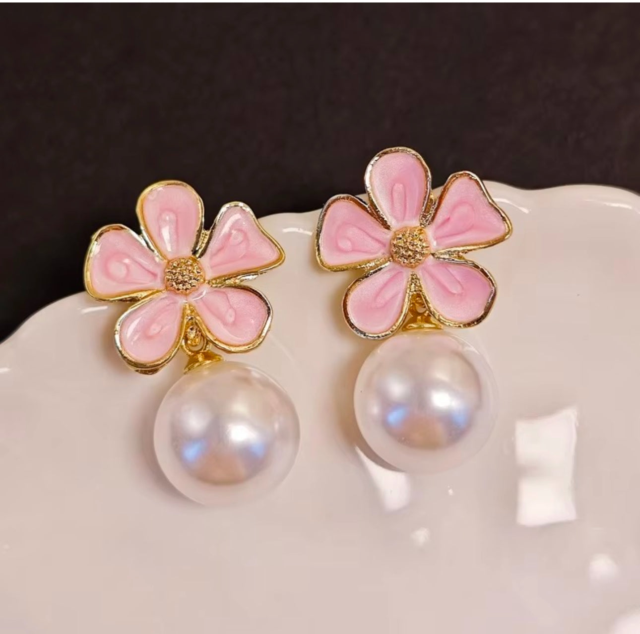 Pink enamel flower with pearl drop dangler earrings