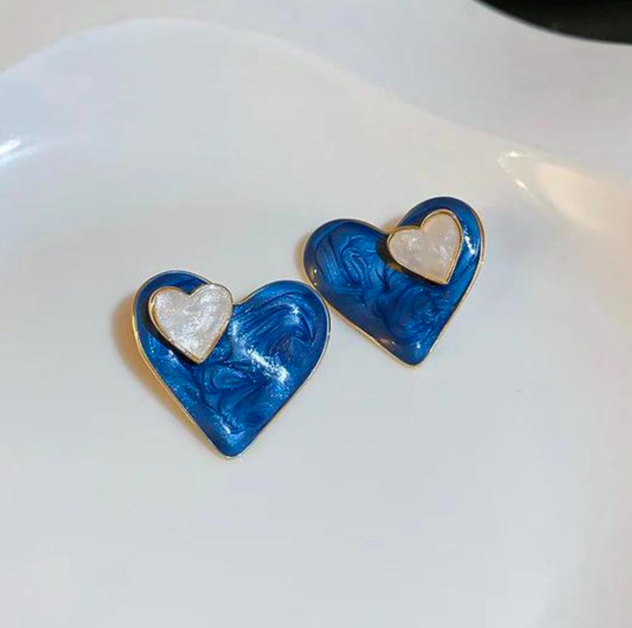 Enamel blue and white heart stud earrings