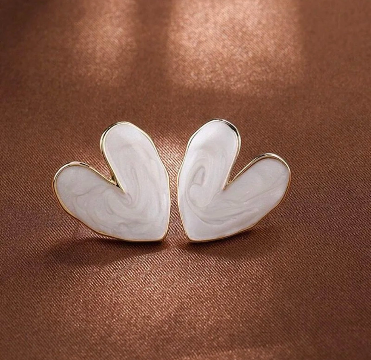 White enamel heart stud earrings