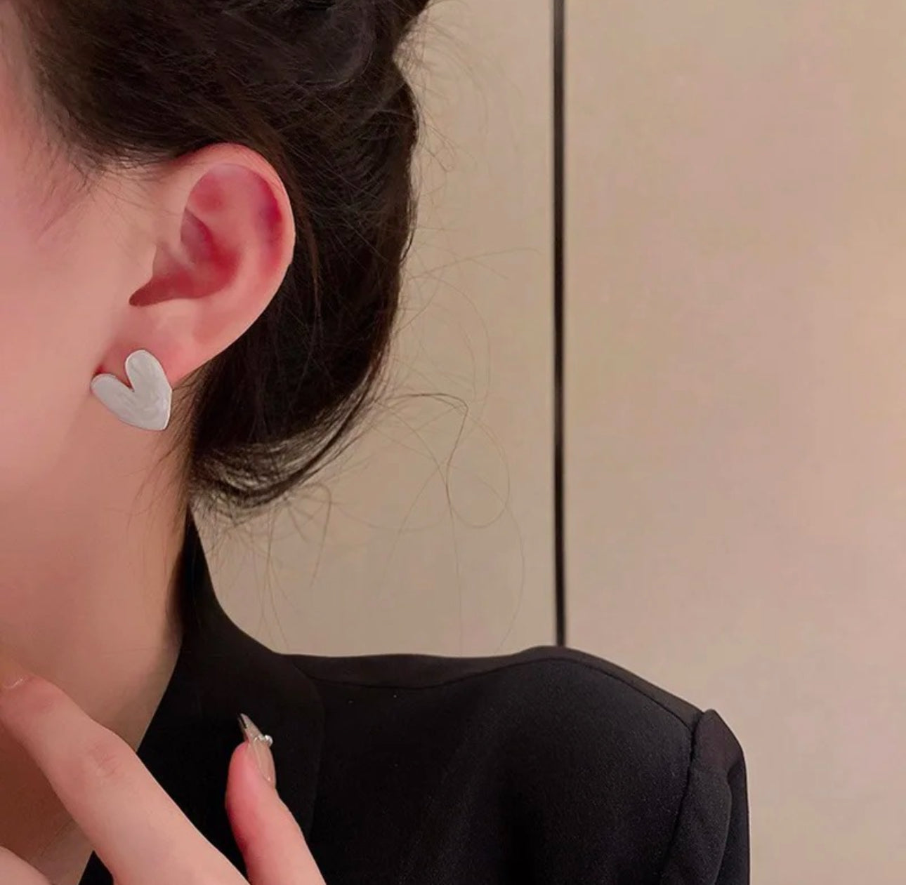 White enamel heart stud earrings