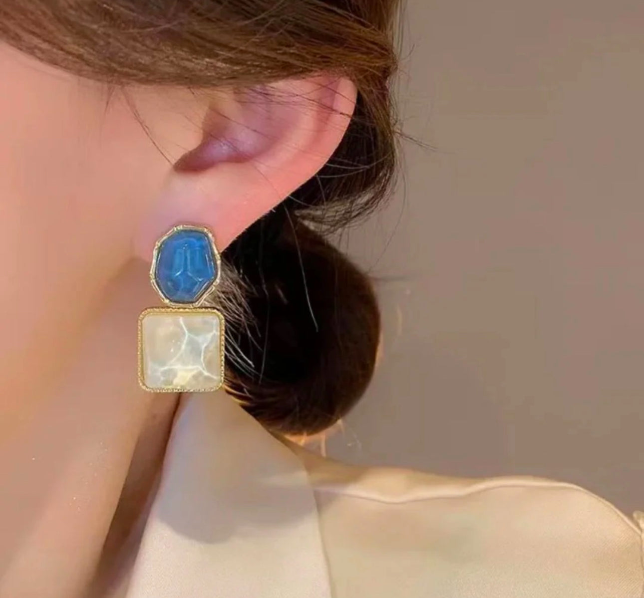 Blue and white stone dangler earrings
