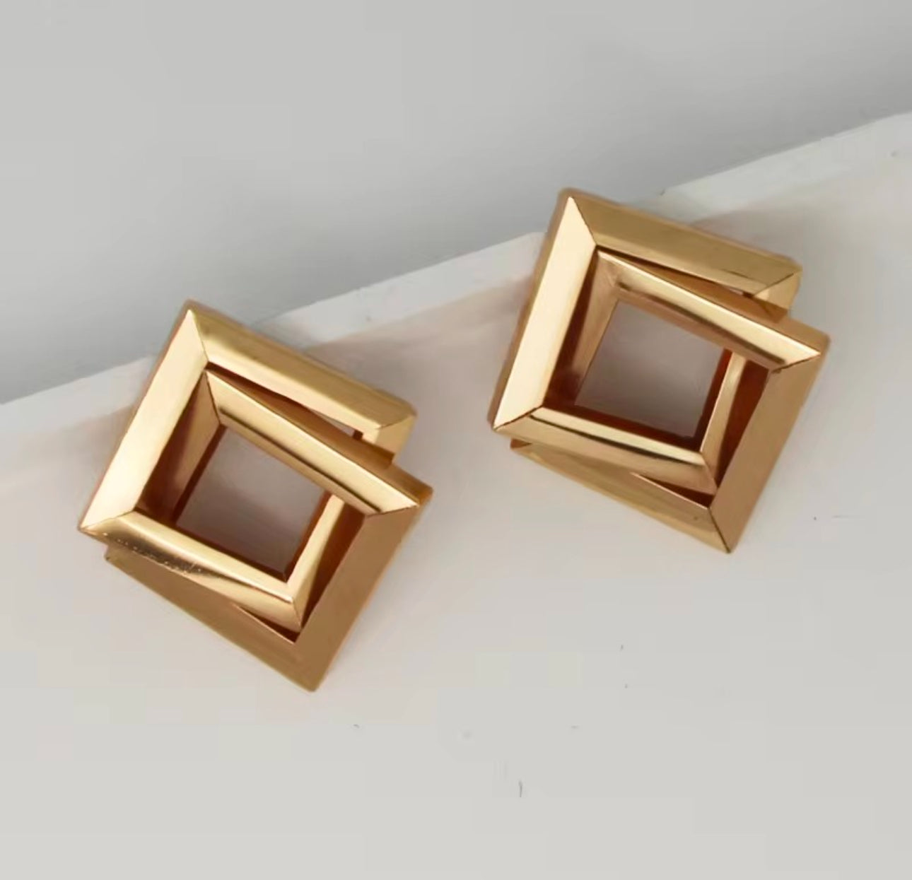 Oversized double layer geometric hoops