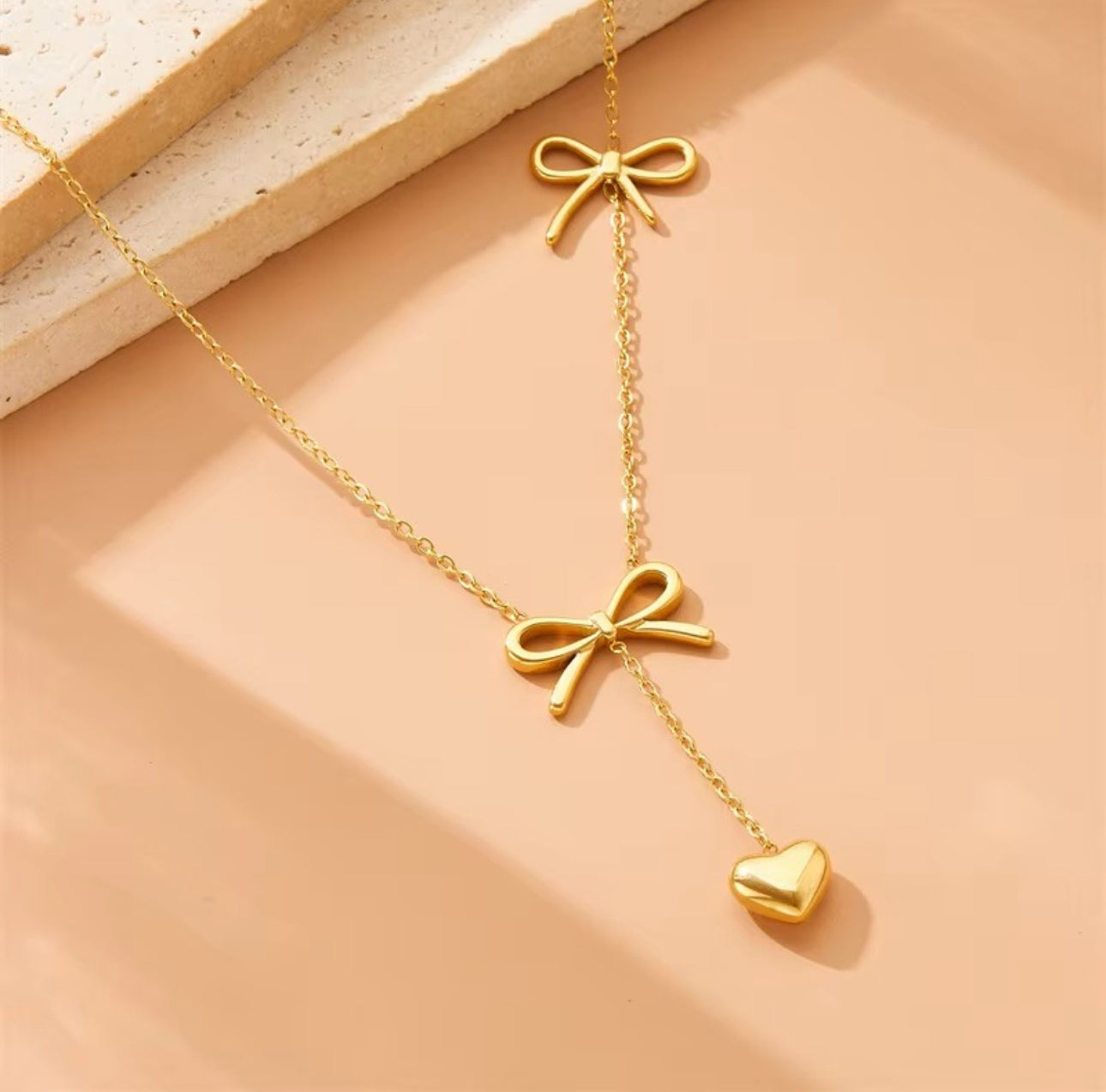 Heart drop two bow necklaces
