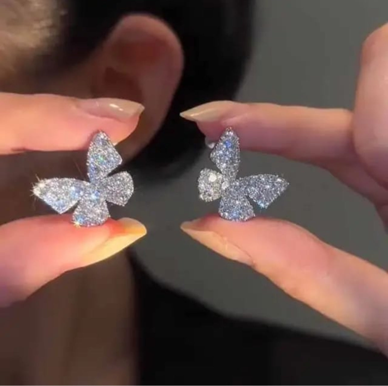 white stone butterfly stud earrings