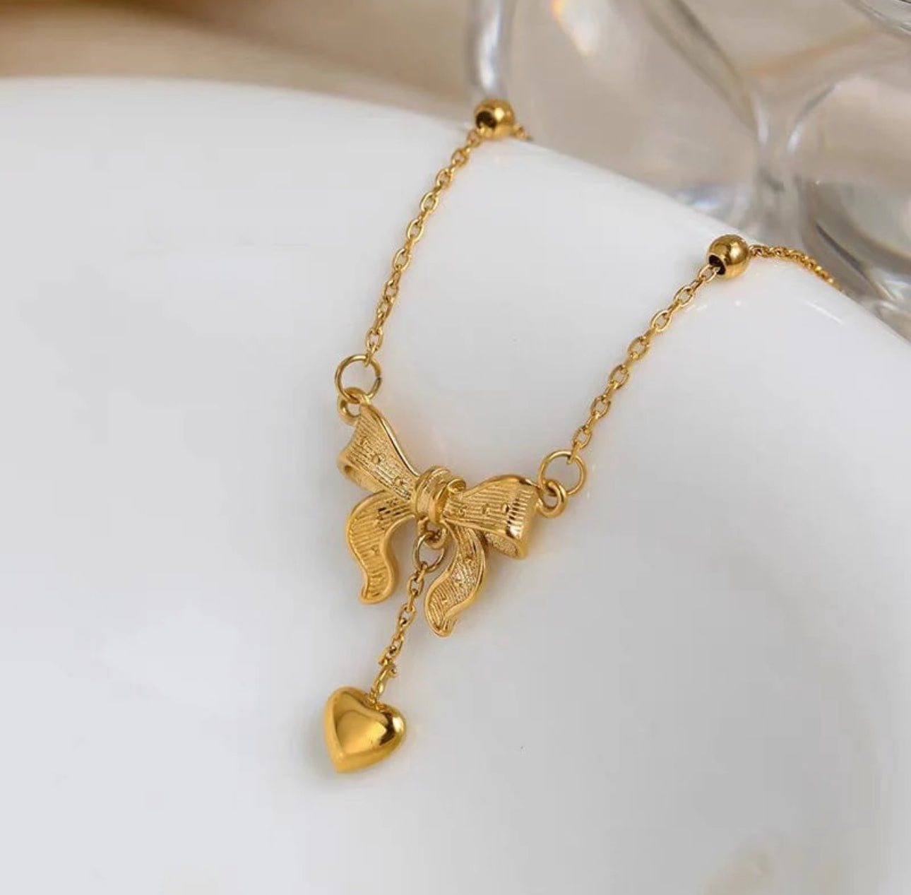 Trendy bow knot anti tarnish necklace
