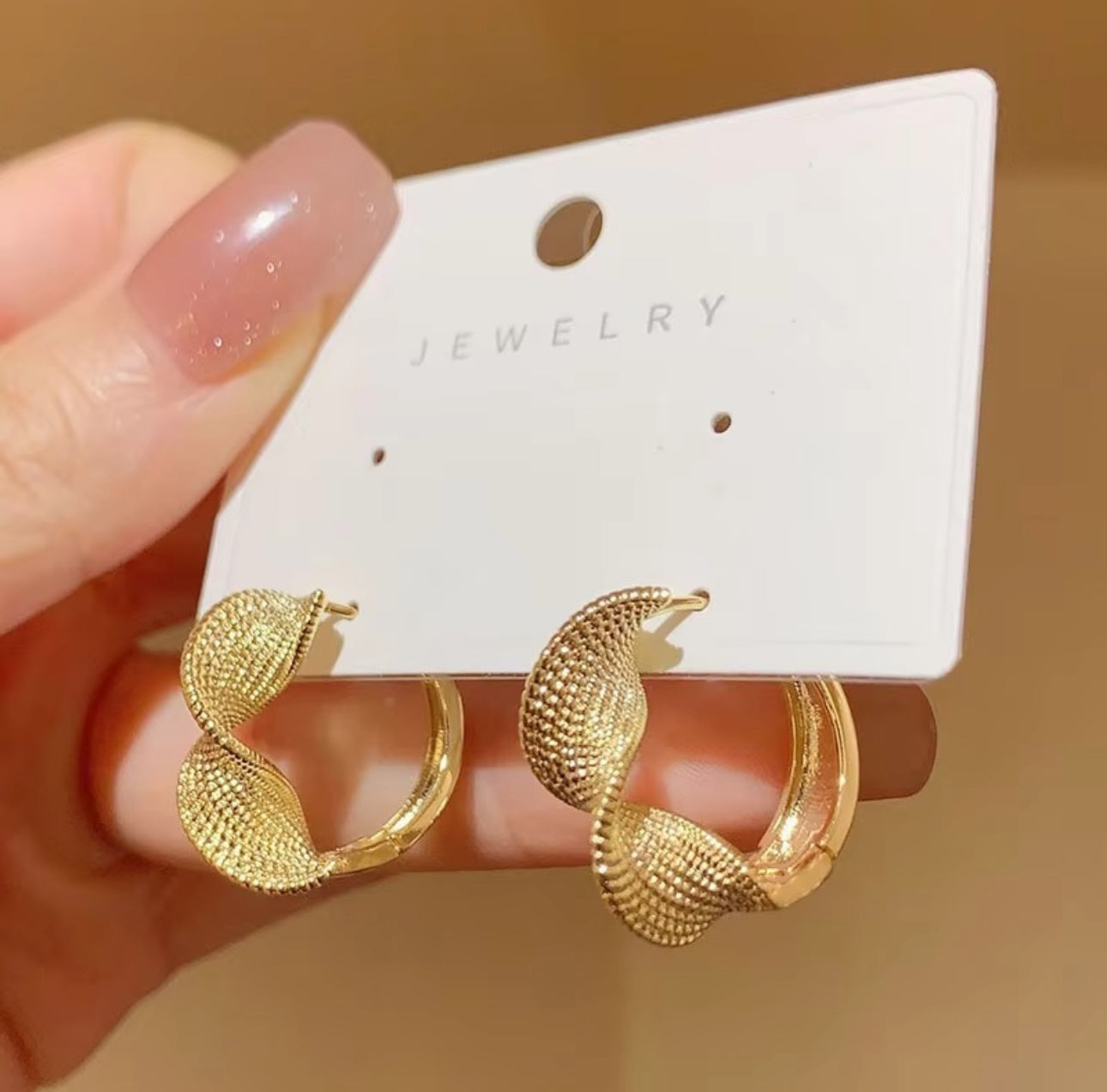 Golden twisted Korean hoops