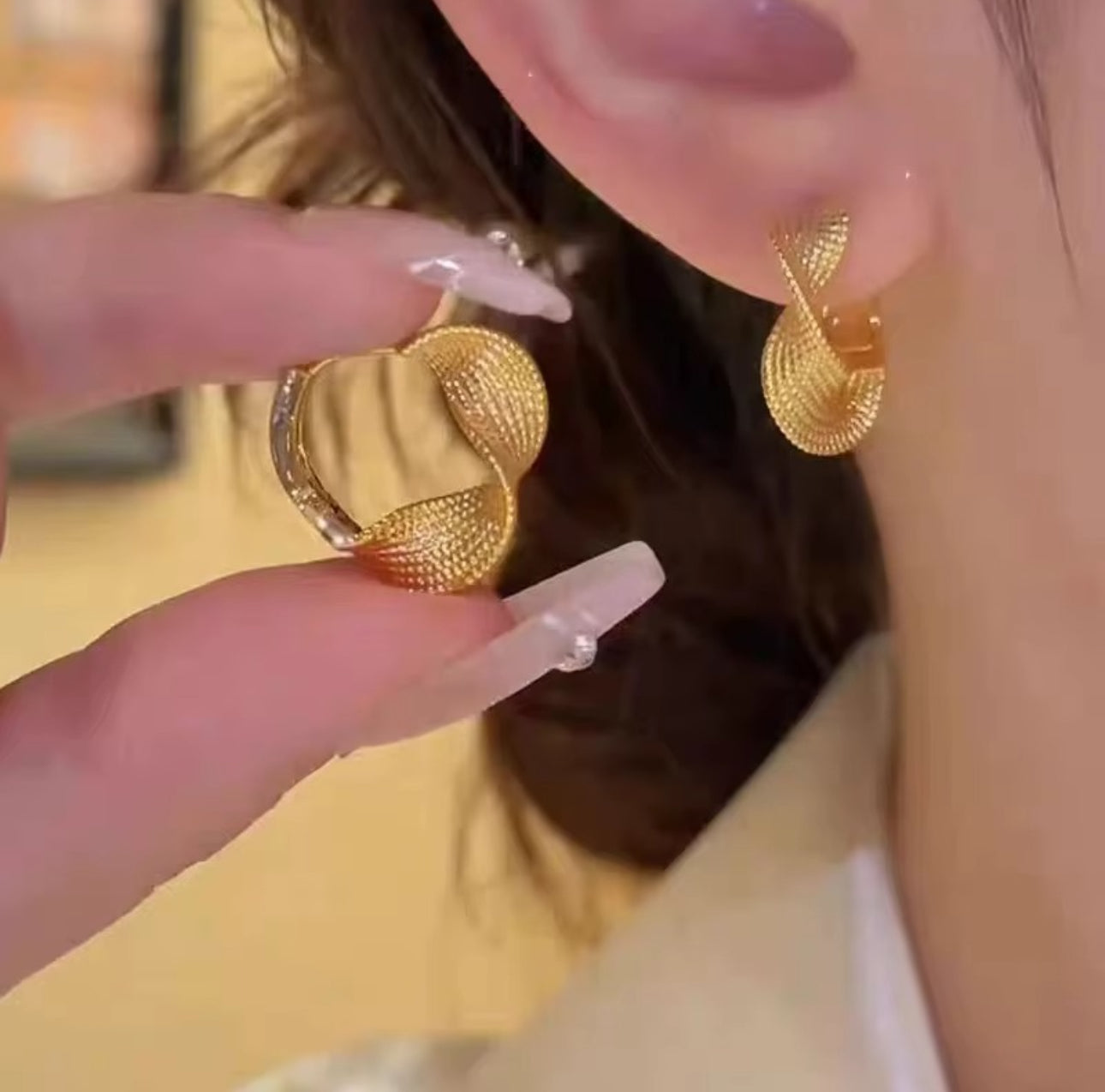 Golden twisted Korean hoops