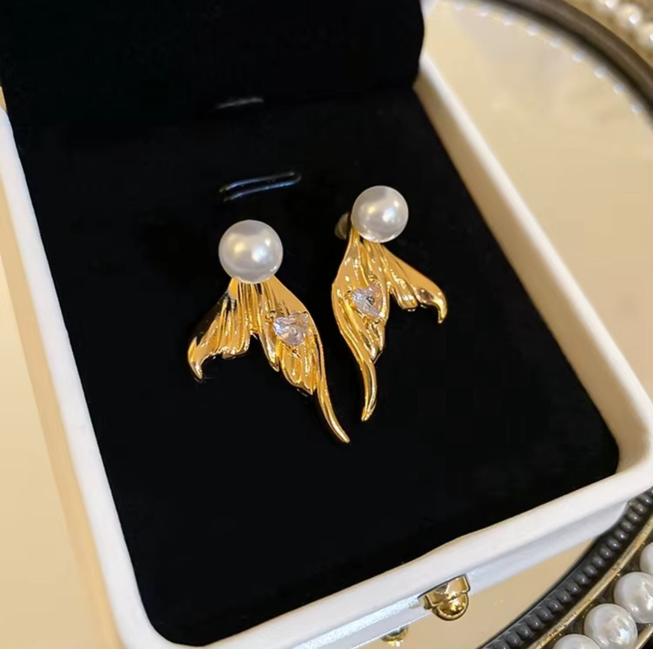 Pearl stud earrings