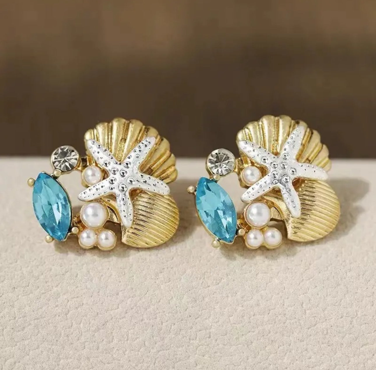 . Amazing metal gold plated starfish shell pearl earrings