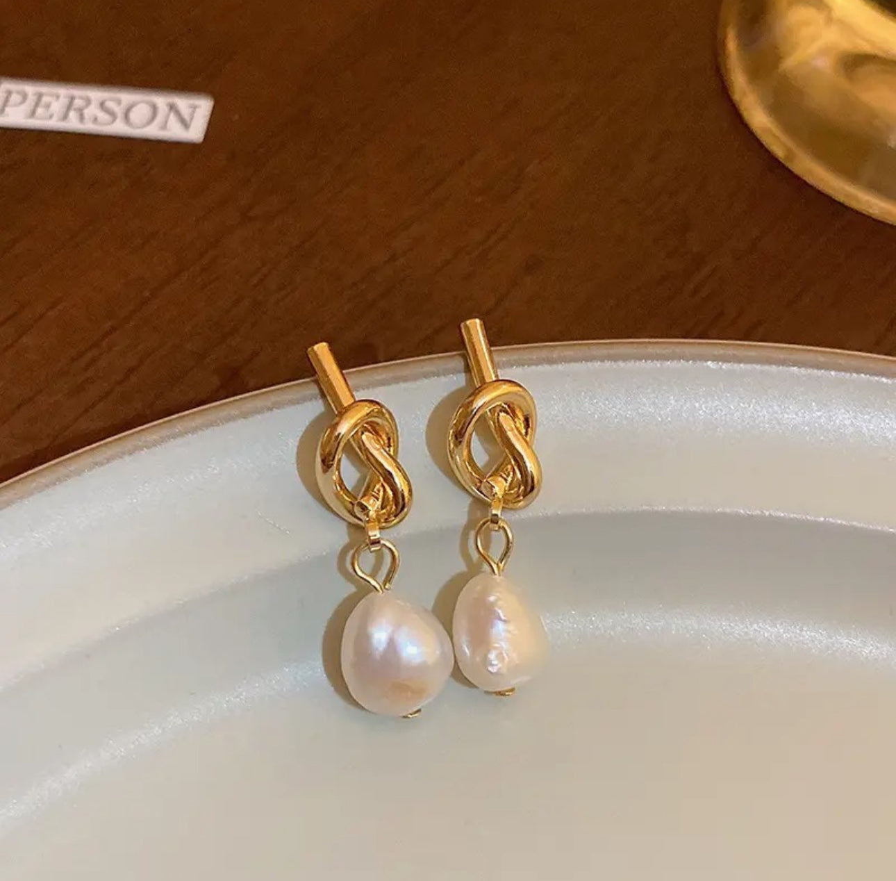 Knotted pearl drop dangle earrings