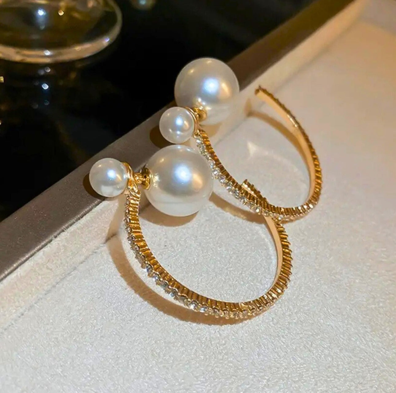 . Gold crystal hoop pearl earrings