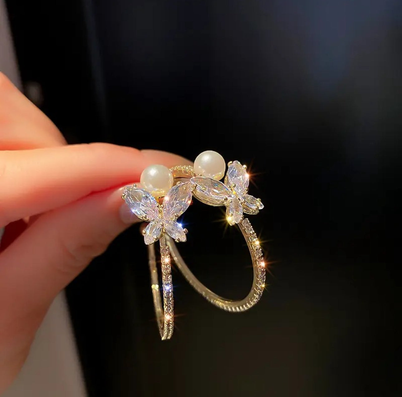 . Gold crystal butterfly hoop earrings