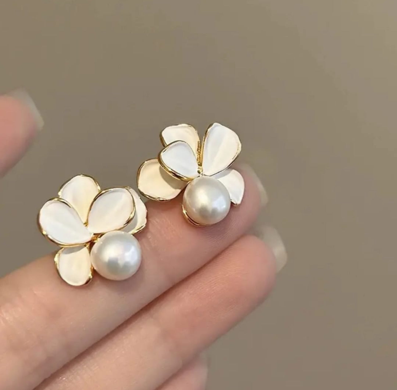White enamel flower with pearl drop stud earrings