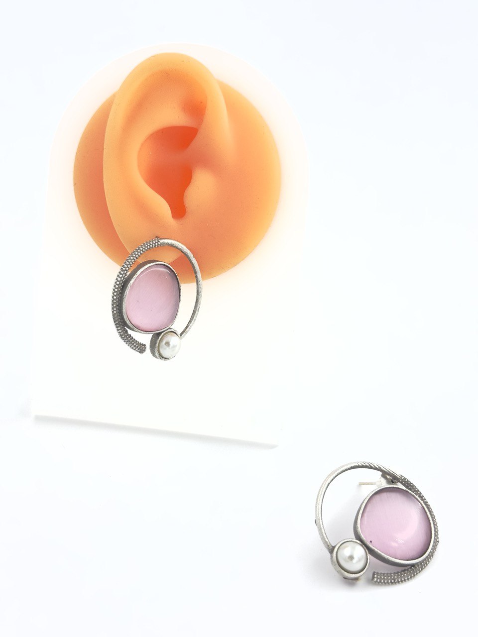 Pink antique studs