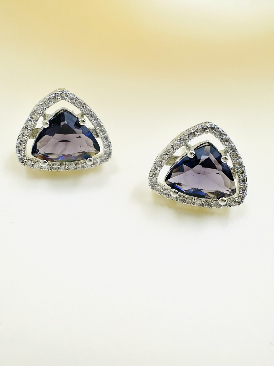 Geometric purple Triangular American Diamond studs
