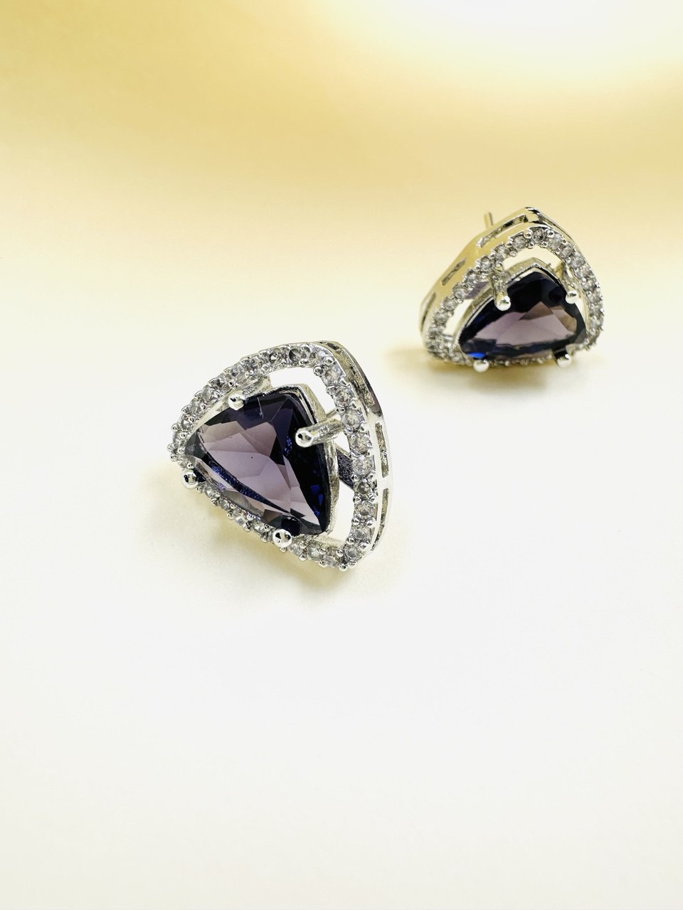 Geometric purple Triangular American Diamond studs