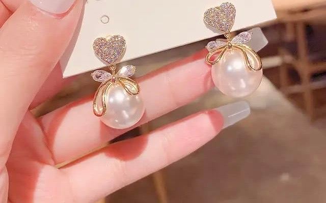 Trendy heart bow pearl drop dangler earrings