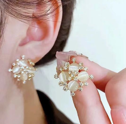 Opal and stones snowflakes earrings