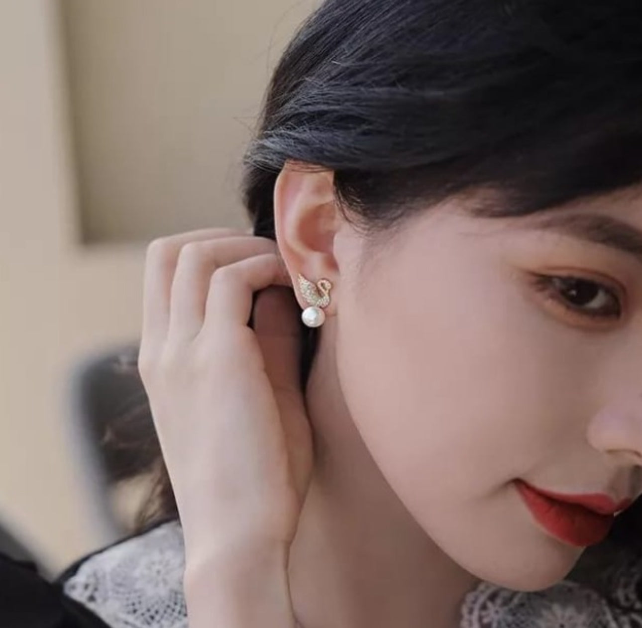 Swan Pearl stud earrings