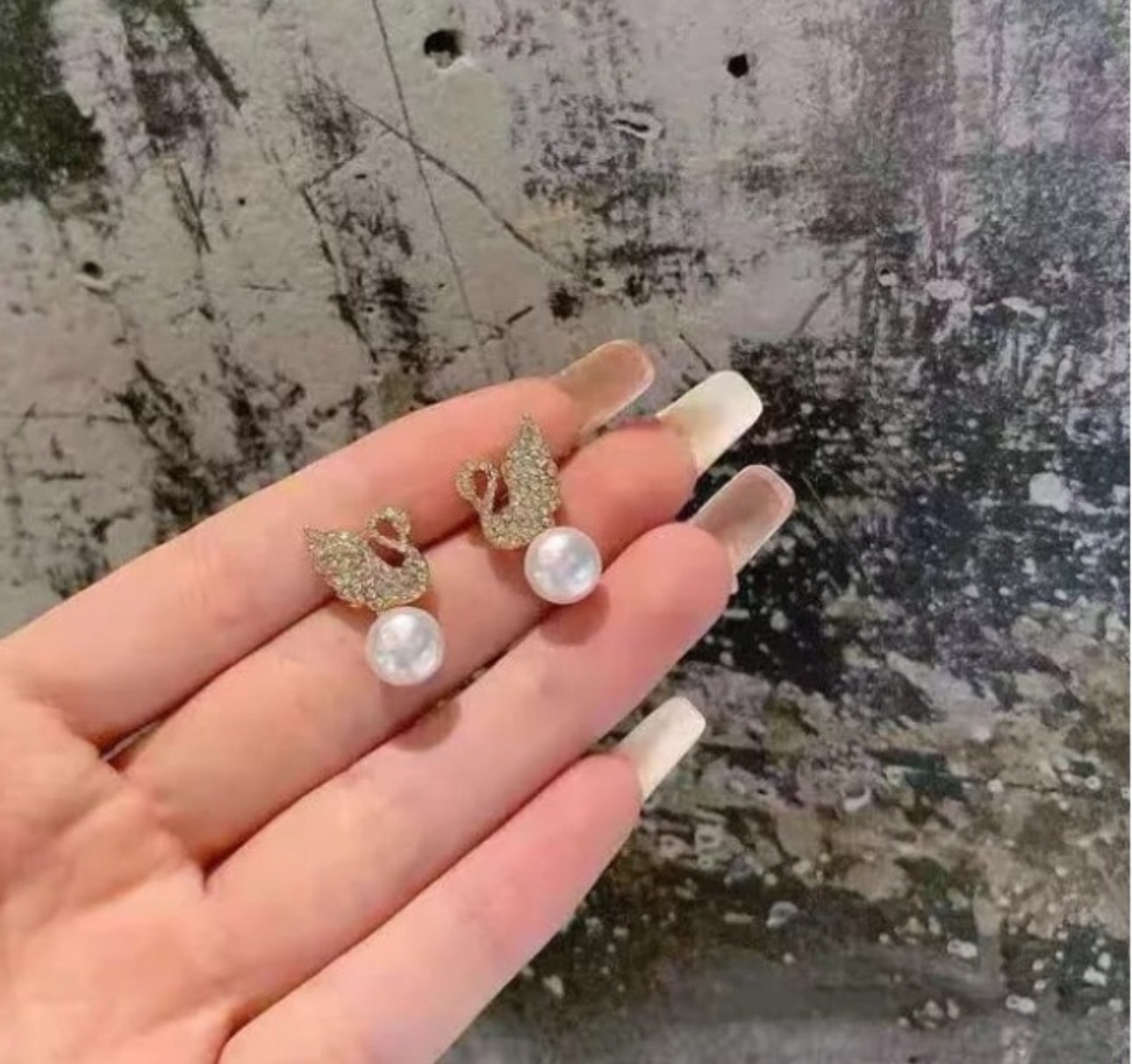 Swan Pearl stud earrings