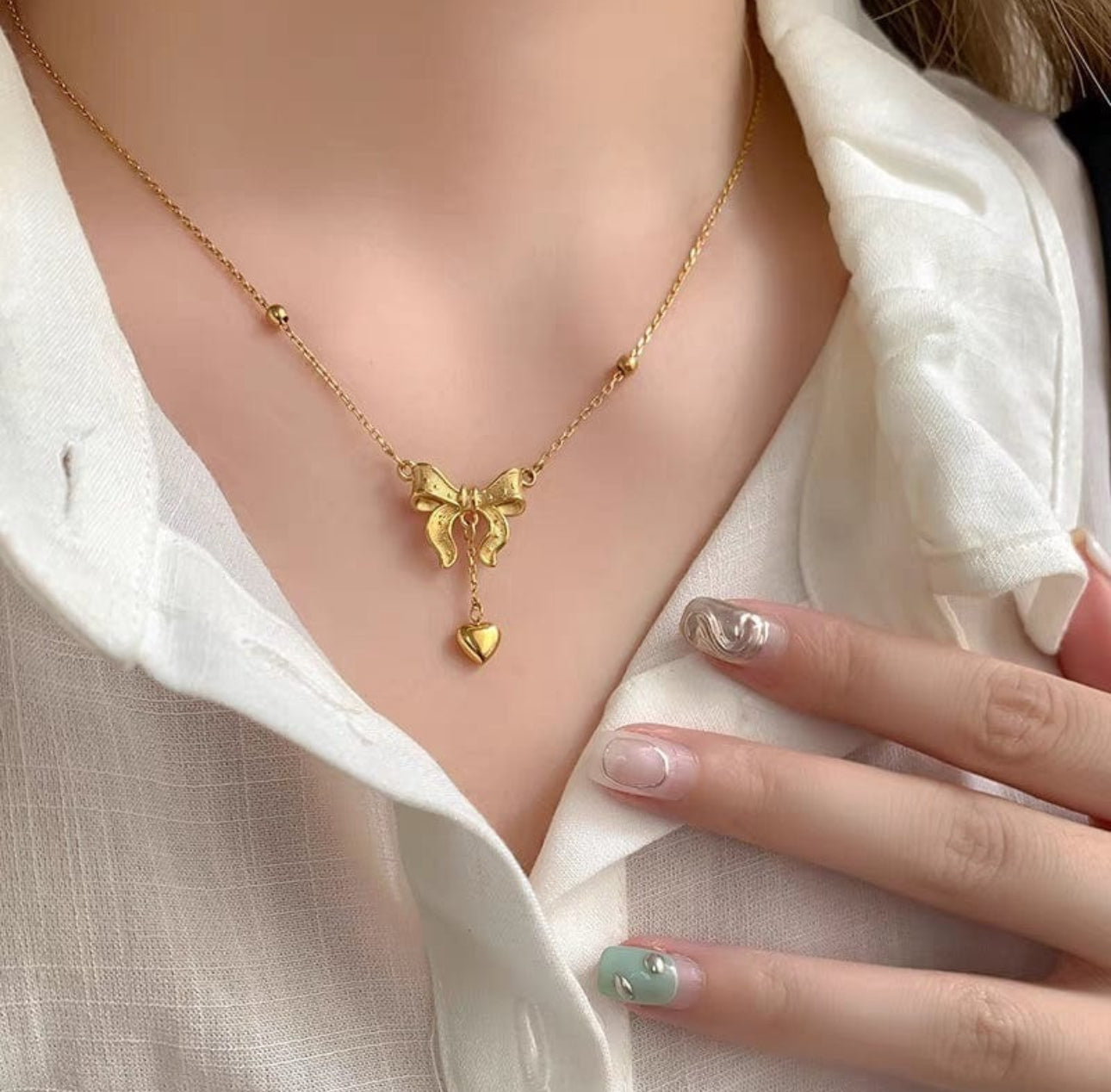 Trendy  bow knot anti tarnish necklace
