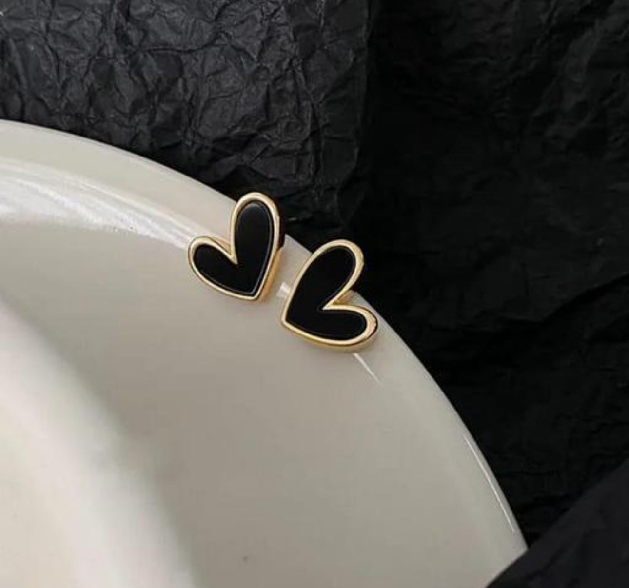 Black enamel heart stud earrings