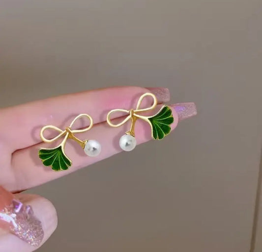 . Enamel pearl bow  ginkgo leaf  stud earrings