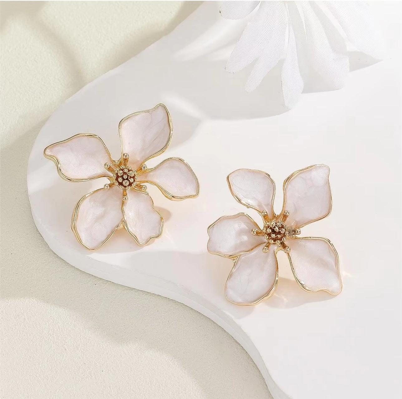 White  Enameled  flora  stud earrings
