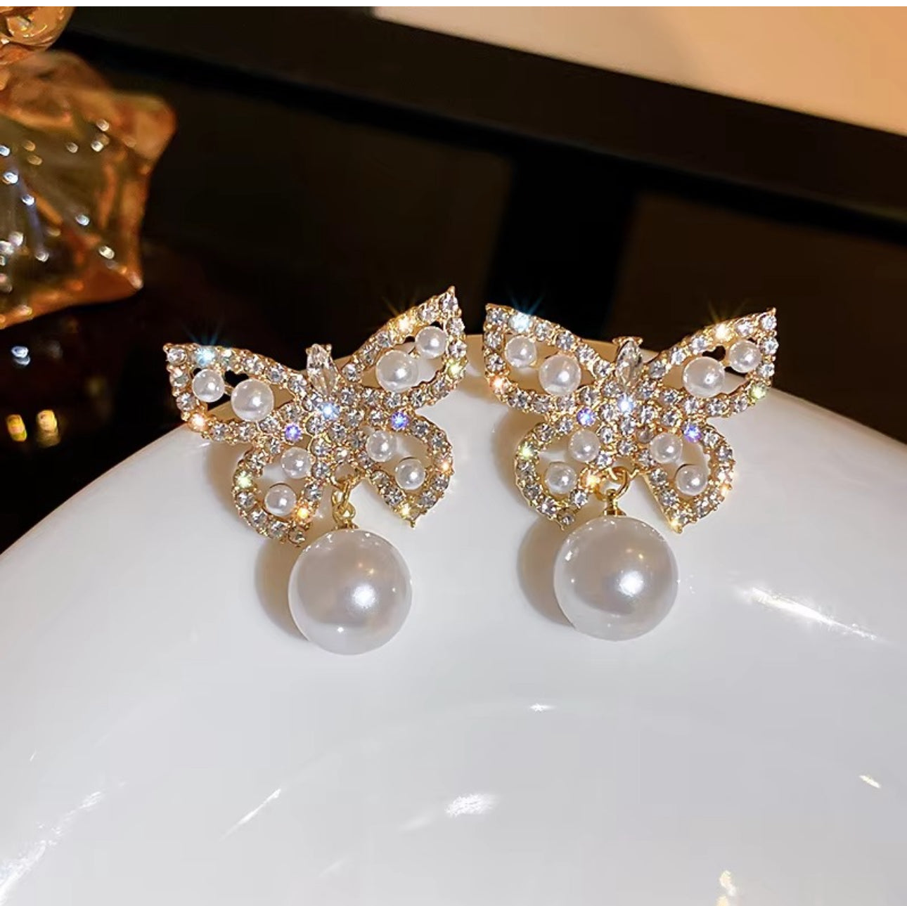 Stone and Pearl butterfly stud earrings