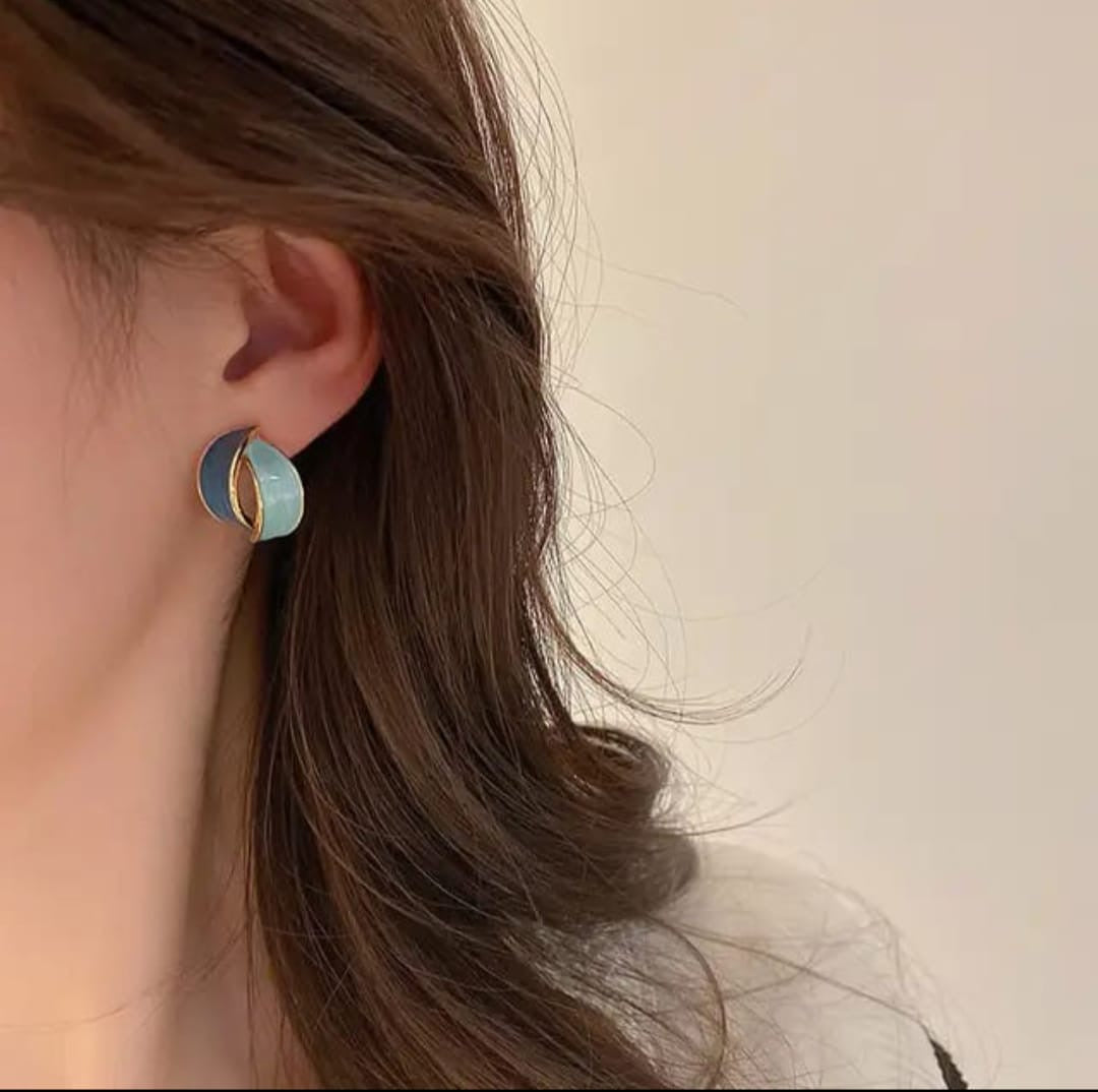 .Enamel blue crossing curve studs
